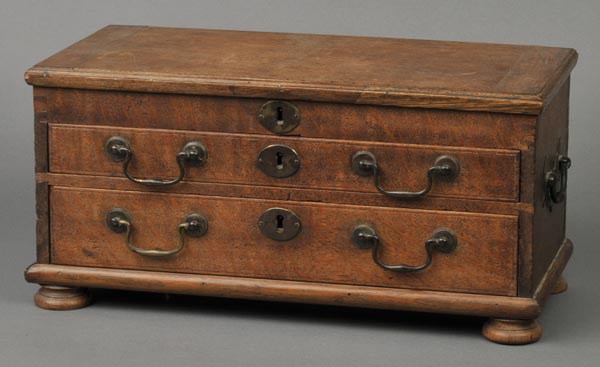 * Chest. An early 19th-century oak chest, of rectangular form with hinged lid enclosing a large