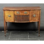 * Sideboard. A George III mahogany bowfront sideboard, with rosewood Trafalgar crossbanding above