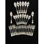 * Flatware. 19th-century French silver plate flatware comprising 8 serving spoons, 8 table forks,