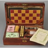 * Games Compendium. A late Victorian mahogany compendium, inlaid with brass escutcheon and key