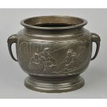 * Japanese Bowl. A Japanese patinated brass jardiniere, decorated with two panels showing warriors,