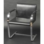 * Ludwig Mies Van Der Rohe (1886-1969). A Brno leather and chrome cantilever chair by Knoll