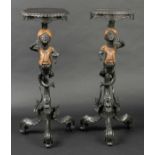 * Blackamoors. A pair of late 19th-century Continental stained pine torchère stands, each finely
