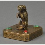 * Inkstand. A Victorian bronze inkstand, modelled as a dog standing on its hind legs begging with a