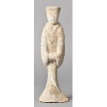 * Chinese Figure. A Chinese earthenware tomb figure, Tang style, stylised features, some traces of