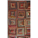 * American Quilt. A large log cabin patchwork quilt, late 19th century, hand-stitched cotton