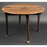 * Table. A George III mahogany drop flap table with gate leg action on pad feet, 74cm high x 106cm