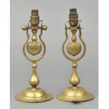 * Ship’s Lamps. A pair of Victorian brass lamp bases, with weighted gimble on baluster and shaped