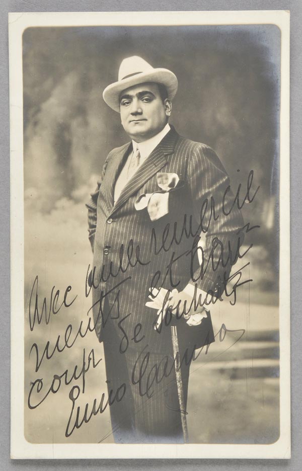 Caruso (Enrico, 1873-1921). Real photo postcard, signed and inscribed, circa 1910,  three-quarter