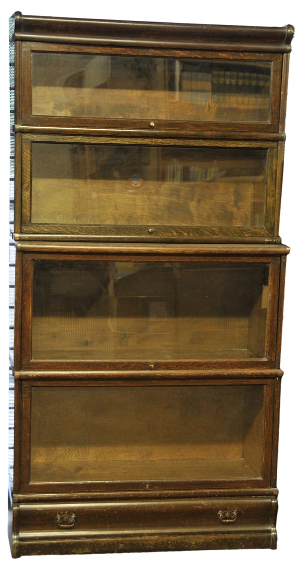 Bookcase. A 1920s Globe Wernicke four tier oak bookcase,  with printed manufacturer's label and