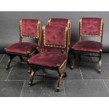 *Dining Chairs. A set of four 19th-century button-upholstered mahogany dining chairs in the manner