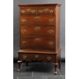 *Tallboy. A George III period oak tallboy,  with two short and three long drawers, on a stand with