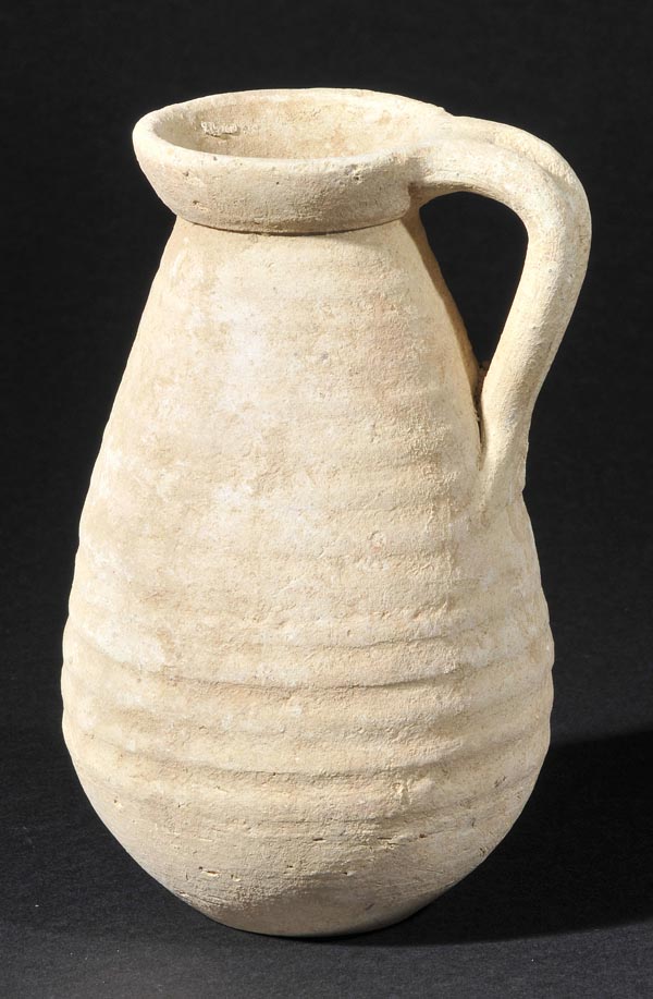 *Roman Pottery. A Roman buffware pottery jug, North Africa, circa 2nd century,  wheel-thrown pottery