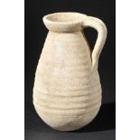 *Roman Pottery. A Roman buffware pottery jug, North Africa, circa 2nd century,  wheel-thrown pottery