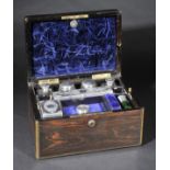 *Vanity Box. A Victorian coromandel wood travelling vanity box, by Asprey & Company,  with brass