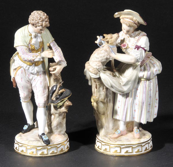 *Meissen. Two 19th-century porcelain figures,  modelled as a young man standing by a tree stump