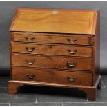 *Bureau. A George III mahogany fall-front bureau,  the hinged fall enclosing drawers, above four