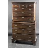 *Tallboy. A George III mahogany tallboy,  with three short and three long drawers each with brass