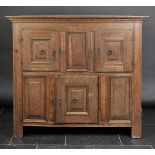 *Court Cupboard. An antique oak court cupboard,  with two panel doors above single door enclosing