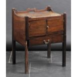 *Night Table. A George III mahogany night table,  with gallery top, twin cupboard doors, and