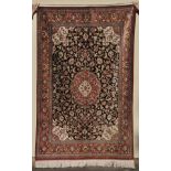 *Oriental Carpet. A fine Persian Kashan-style silk hand knotted carpet, 20th century, hand knotted