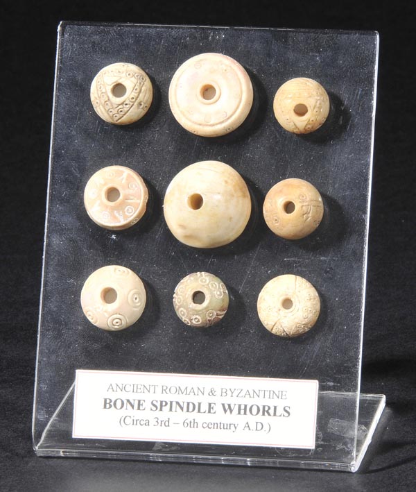 *Roman Bone. A group of nine Roman and Byzantine turned bone spindle whorls, various dates, 3rd to