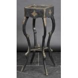 *Stand. A Victorian ebonised jardiniere stand,  with brass mounts, and undertier shelf on splayed