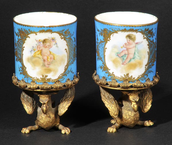 *Sevres. A pair of Sevres-style ormolu mounted porcelain pedestal cups, late 19th century,  each