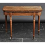 *Table. A William IV mahogany fold-over card table,  with rounded corners hinged to reveal green