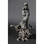 *Root Carving. A Chinese carved figure of an immortal on a tree root base, late 19th century,