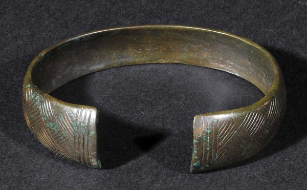 *Viking Bracelet. A fine Viking bronze penannular bracelet with chequered pattern, Northern