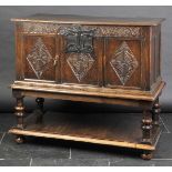 *Chest on stand. An oak chest on stand, converted from a coffer,  the rectangular top with two front
