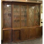 *Bookcase. A George III mahogany breakfront bookcase,  with three astragal glazed doors enclosing