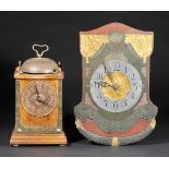 *Art Nouveau. A Continental early 20th-century wooden wall clock,  carved with faces amongst gilt-