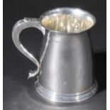 *Mug. A George VI silver mug by Hicklenton & Sydal, London 1935,  of baluster form with scroll