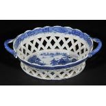 *Chestnut Basket. An early 19th-century twin handle pottery blue and white chestnut basket,