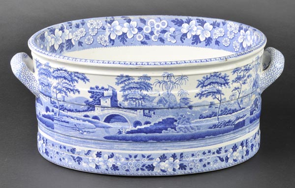 *Footbath. A Victorian blue and white twin handle pottery footbath,  printed with landscapes, 21cm