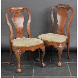 *Chairs. A fine pair of George I walnut chairs, circa 1720,  each with carved scallop shell top