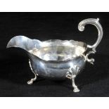 *Sauce Boat. A George II silver sauce boat, makers mark rubbed probably by John Swift, London 1752,