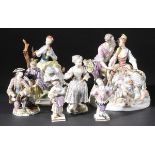 *Porcelain Figures. A collection of porcelain figures including a 19th-century Meissen figural