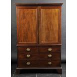 *Linen press. A 19th-century mahogany linen press,  with twin panel doors enclosing hanging space