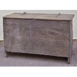 *Coffer. A 17th-century Welsh primitive oak coffer,  with iron hinges and plate, the hinged lid