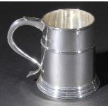 *Mug. A George VI silver mug by Hicklenton & Sydal, London 1935,  of tapered form with scroll