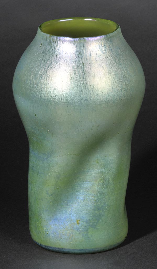 *Art Glass. A Loetz style Papillion glass vase,  with a swirl design in green lustre, ground