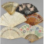 *Fans. A 19th-century Chinese Export ivory fan,  with twenty-one staves all intricately carved