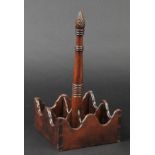 *Bottle Stand. A good Victorian mahogany four bottle stand,  the square base with long straight