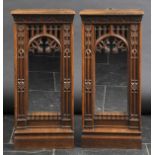 *Mirrors. A pair of oak Ecclesiastical mirrors in the Gothic style,  heavily carved with later