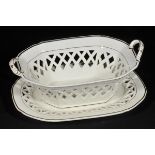 *Cream Ware. An 18th century twin handled chestnut basket,  of tapered form with lattice work