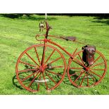 *A circa 1869 Vélocipède. Finished in a pleasant shade of red with cream lining to the wheels and