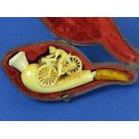 *Meerschaum Cheroot Holder. Contained in a fitted hinged case, a three-dimensional racing cyclist of